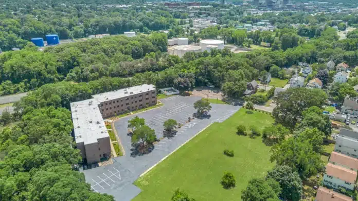 Aerial wide view of Boca Recovery Center drug rehab campus set amid greenery in Springfield, Massachusetts.